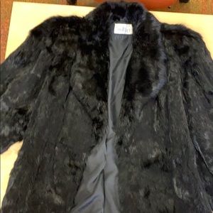 Switzer’s black real fur coat